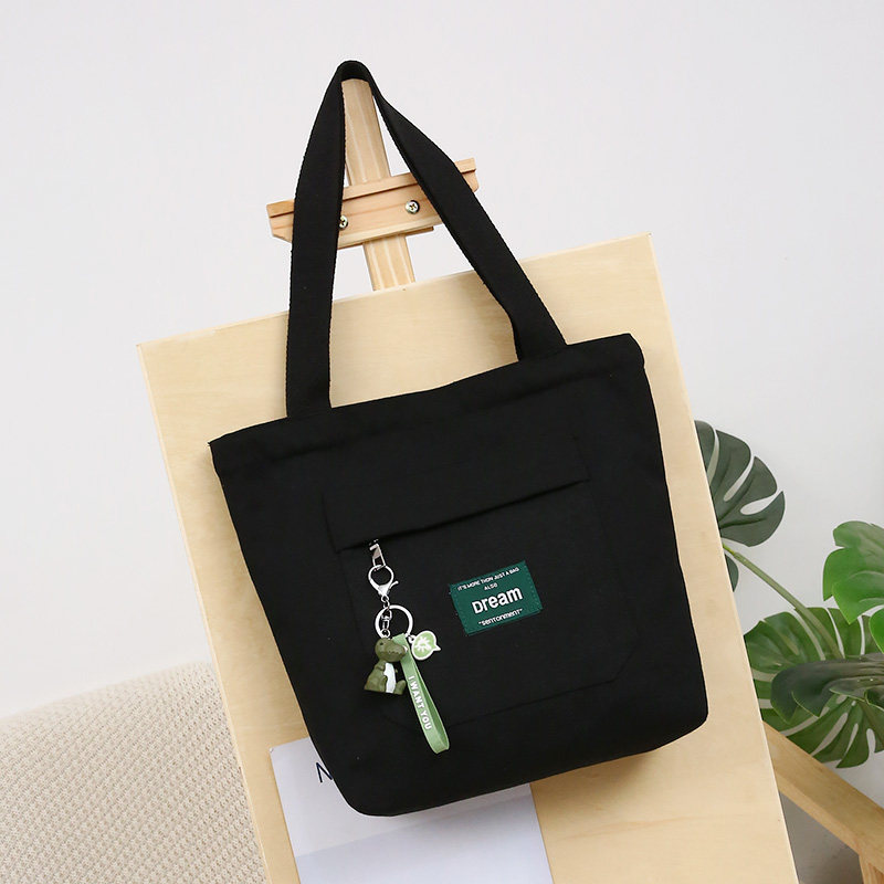 黑色女单肩斜挎手提装书袋a4帆布包 萨凯莉女士包袋