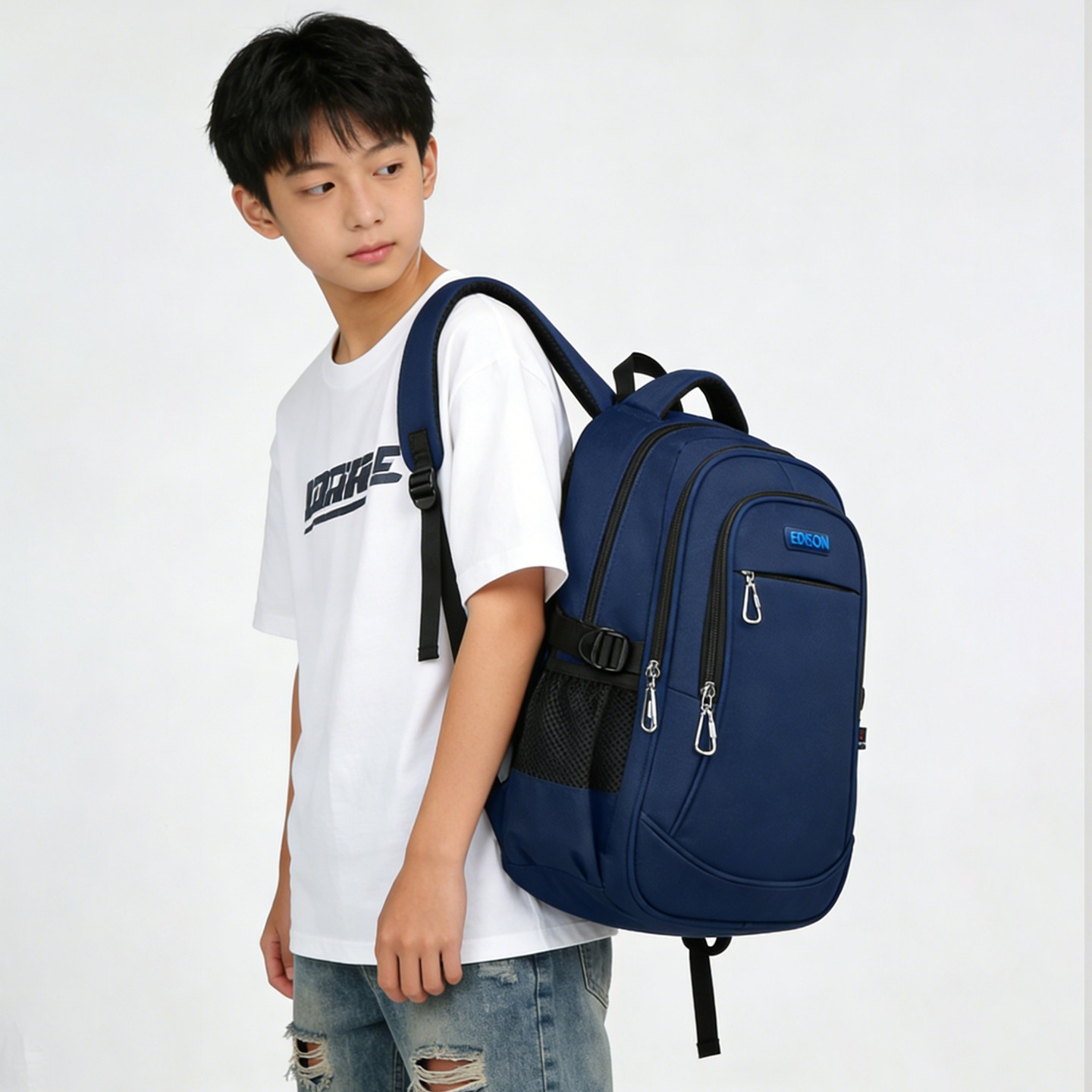 爱迪生中学生书包护脊防泼水大容量初中小学生高年级校园双肩背包