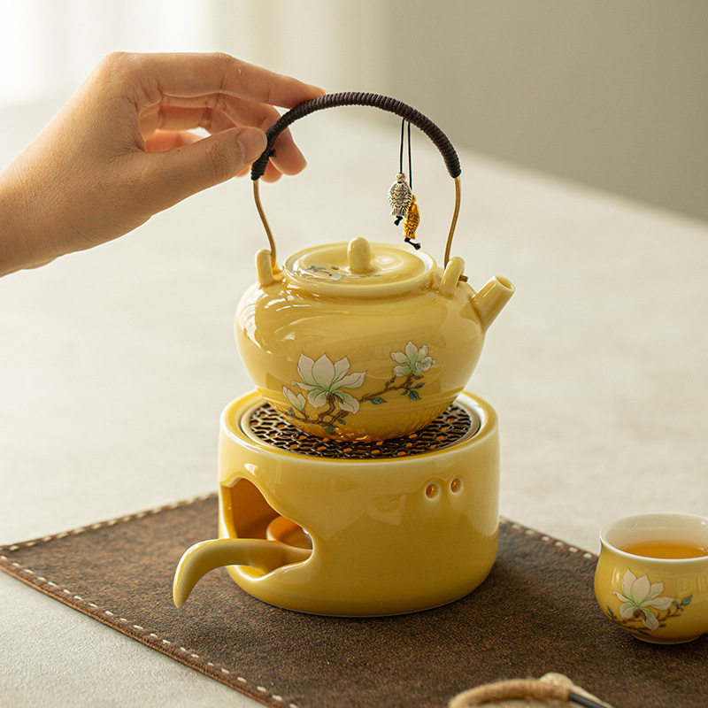 Yao yellow magnolia teapot candle heating tea stove