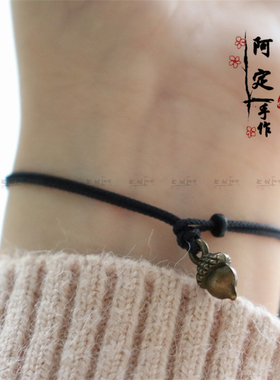 可爱古风古铜榛子细黑手绳情侣女