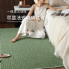 Saipos gilded green wool bedside rug