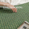 Saipos gilded green wool bedside rug