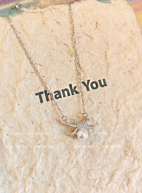 珍珠蝴蝶结钛钢项链配饰女2026爆款高级感轻奢小众锁骨颈链项饰品