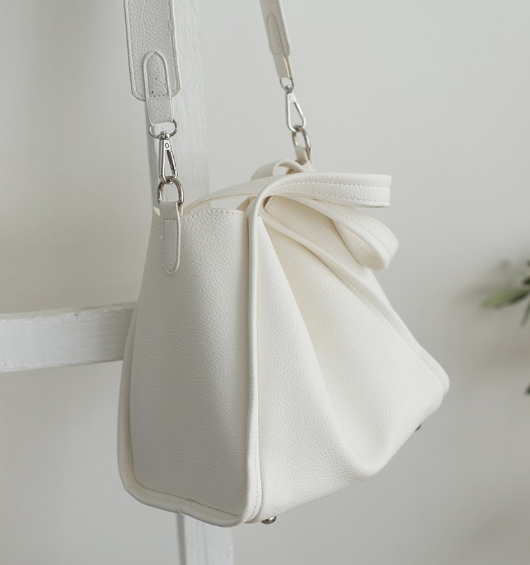 氧气种子2026春季新款日韩百搭纯色单肩斜挎慵懒风垂感软皮水桶包,淘宝优惠券,粉丝福利购,淘宝优惠卷