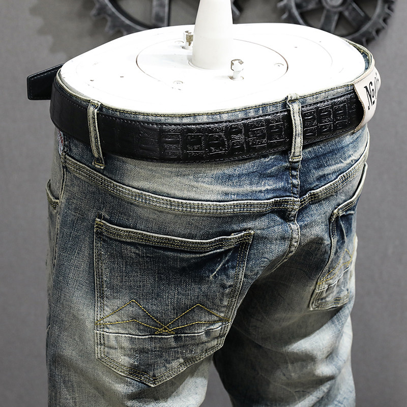 春秋休闲牛仔裤男修身小直筒潮牌裤子牛仔复古破洞补丁长裤男士