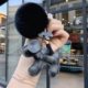 Suitable for LV ladies bag pendant new high-end leather doll bow dog keychain trinket trend