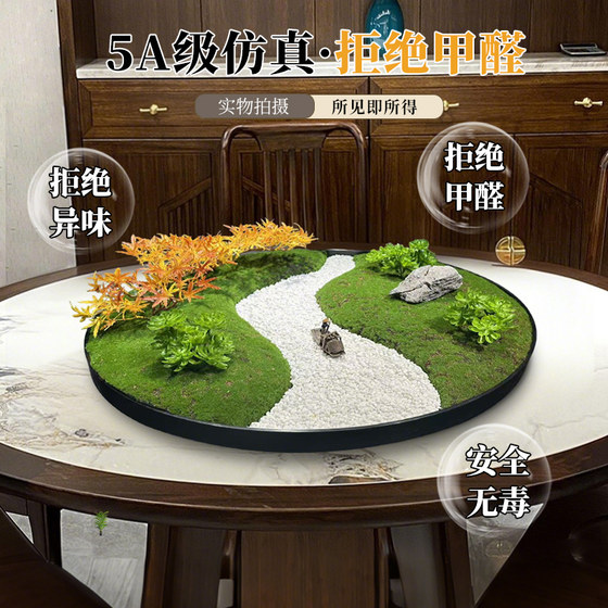 Large round table with flowers in the center of the turntable