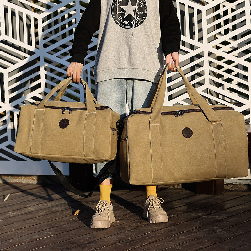 大容量加厚帆布手提男超大行李包 乾多旅行袋