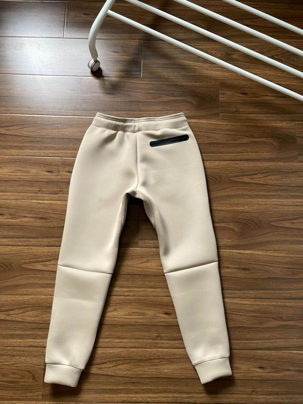 外贸日单 复古空气层卫裤男女情侣拉链口袋束脚运动休闲裤长裤,淘宝优惠券,粉丝福利购,淘宝优惠卷