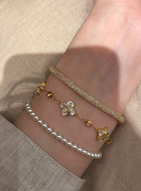 花朵金色碎碎冰镭射四叶花手链