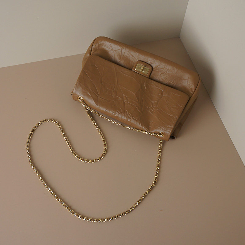 怪兽君包包2025新款真皮通勤腋下包褶皱头层牛皮邮差包质感链条包,淘宝优惠券,粉丝福利购,淘宝优惠卷