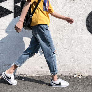 夏季新款毛边破洞牛仔裤