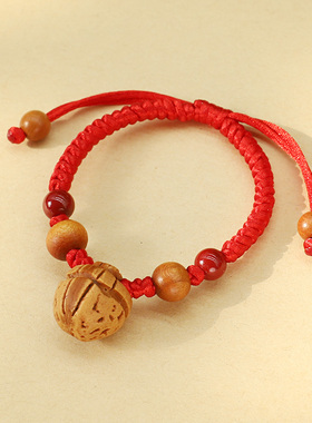宝宝婴儿童桃核狗牙红绳手链