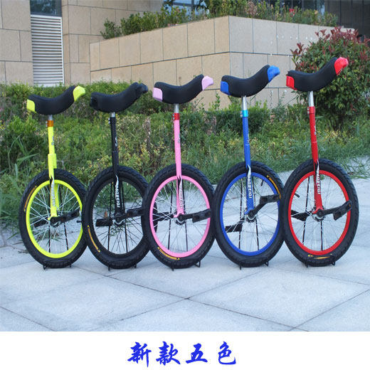 Baby riding unicycle balancing athletic children