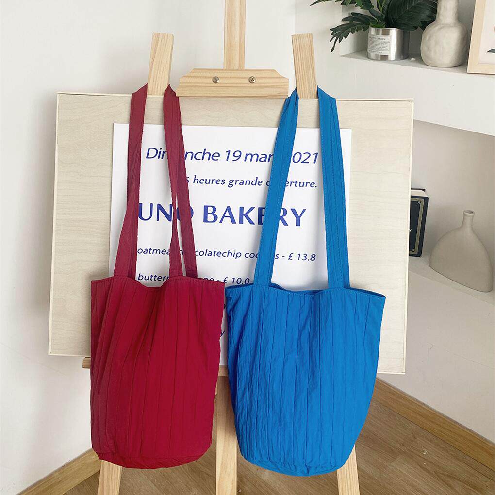 夏季小清新纯色竖条纹水桶包简约小众设计高级感褶皱单肩腋下女包,淘宝优惠券,粉丝福利购,淘宝优惠卷