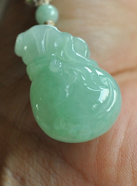 缅甸A货老坑冰润果绿翡翠钱袋子