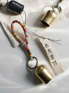 氛铜东巴平安小铃铛创意东巴纸锤纹黄铜风铃藏风手绳配饰小众礼物