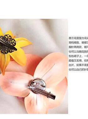 辣妹穿搭桔黄色花朵发饰蝴蝶兰头花发夹度假拍照氛围感头饰发卡子