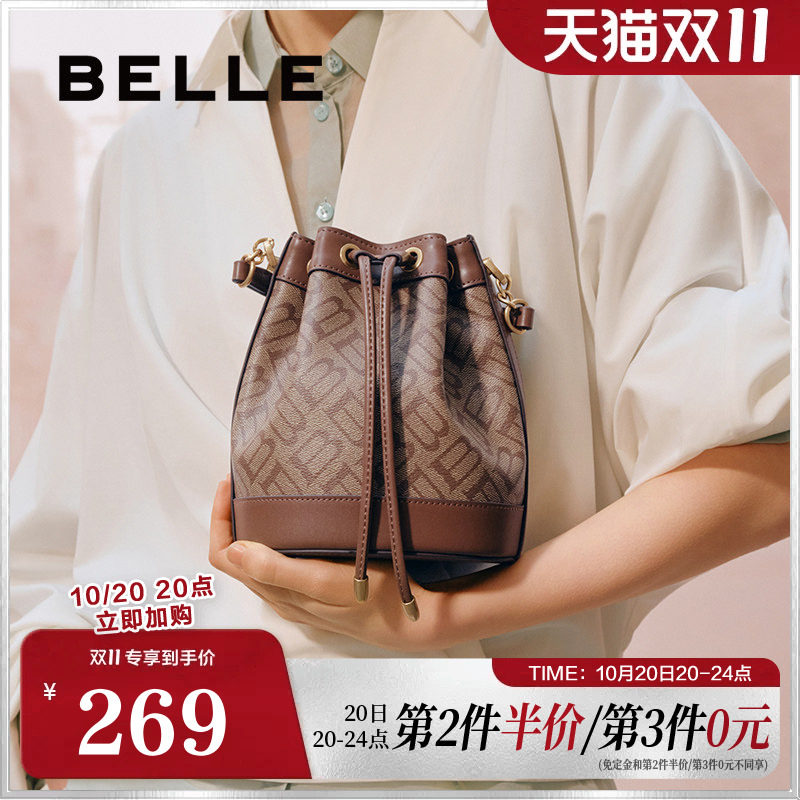 百丽包包女春季新款商场同款复古休闲单肩斜挎手提水桶包X7232AX5