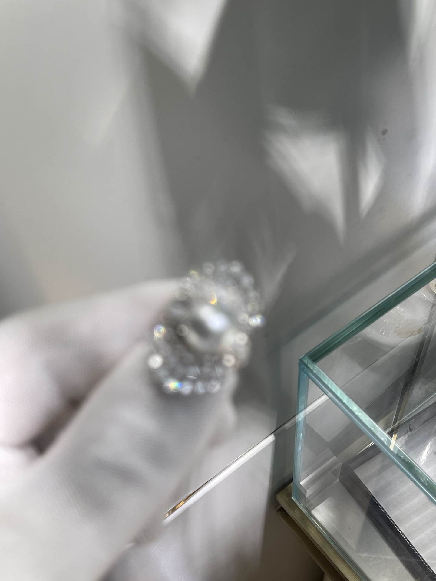 A two-wear ring that can be worn daily or for flamboyance. 10.64mm Australian white set with 18k natural diamonds. Dazzling.