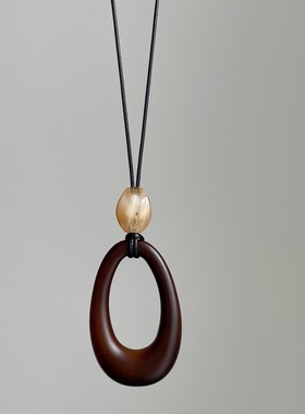 韩国木质项链女黑皮绳椭圆吊坠小众高级感民族风长款毛衣链