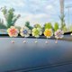 Car small ornaments shaking head car interior decoration center console good rearview mirror cute electric car ornaments shaking