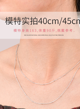 纯银18k镀金圆珠十字侧身项链