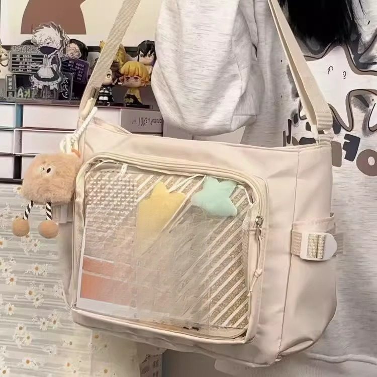 学院风百搭简约大容量上课装书邮差包女透明吧唧单肩斜挎娃包痛包,淘宝优惠券,粉丝福利购,淘宝优惠卷