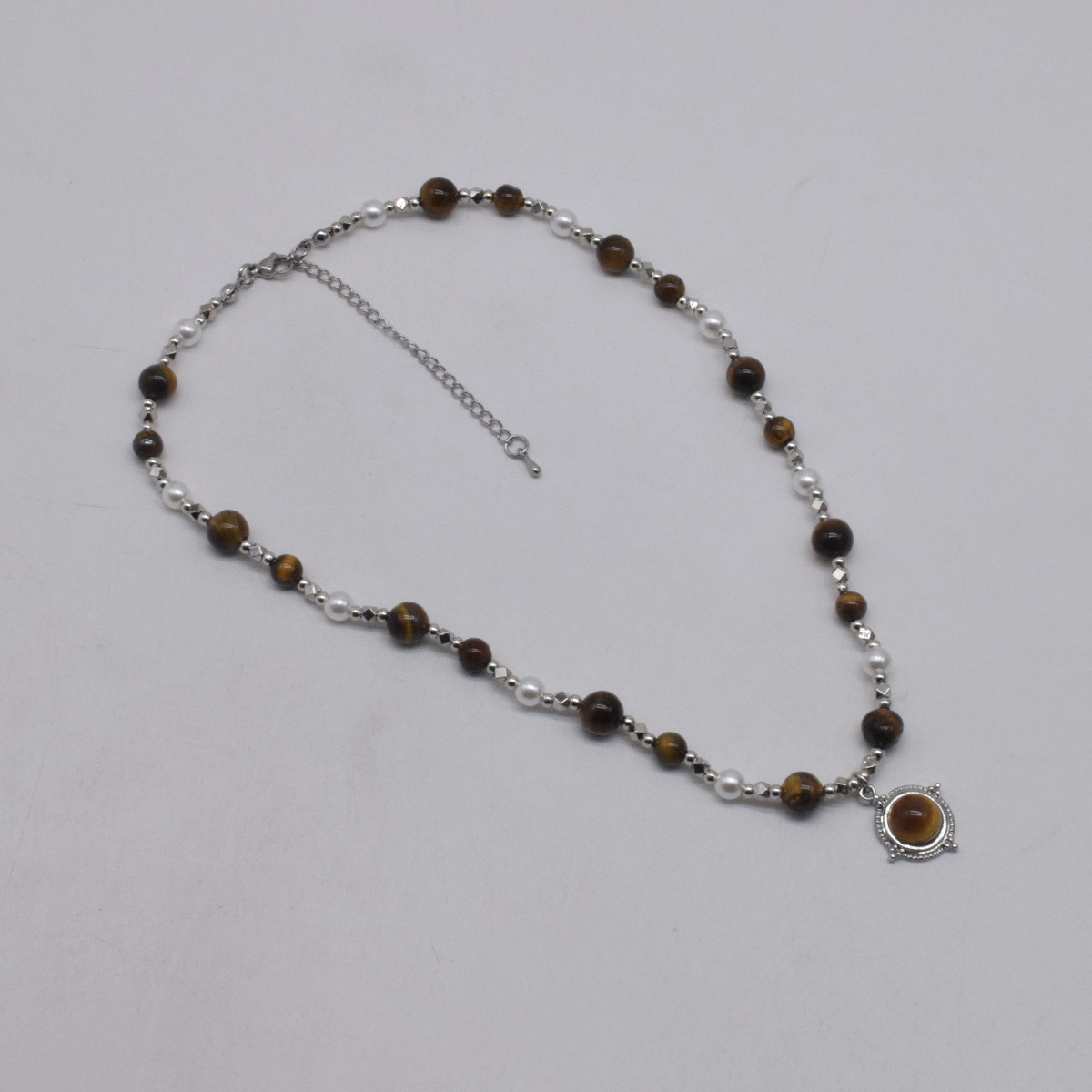 复古美拉德虎眼石吊坠项链轻奢简约颈链毛衣链长款小众设计锁骨链,淘宝优惠券,粉丝福利购,淘宝优惠卷