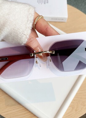 2026春季新品太阳镜无框切边变色眼镜户外摆拍凹造型防紫外线眼镜