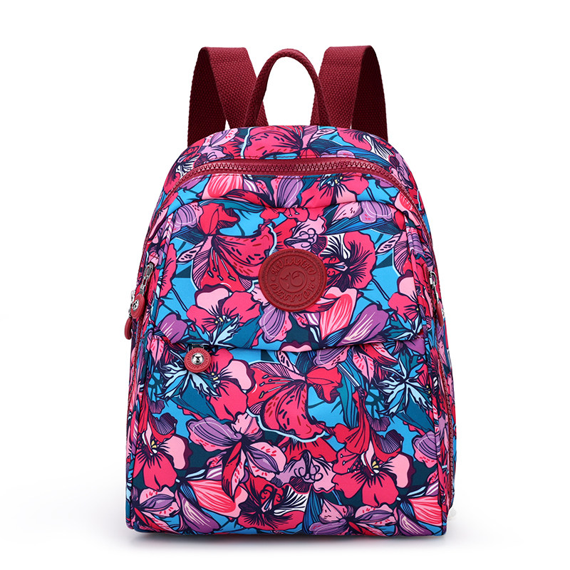 印花贝壳双肩包女2025新款时尚百搭大容量轻便防水旅行背包书包包,淘宝优惠券,粉丝福利购,淘宝优惠卷