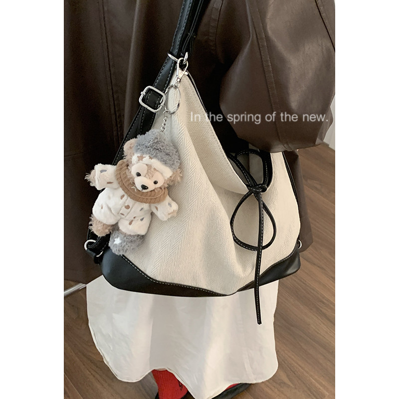 韩国大容量帆布包包女2025新款潮学院托特包休闲单肩水桶包旅行包,淘宝优惠券,粉丝福利购,淘宝优惠卷