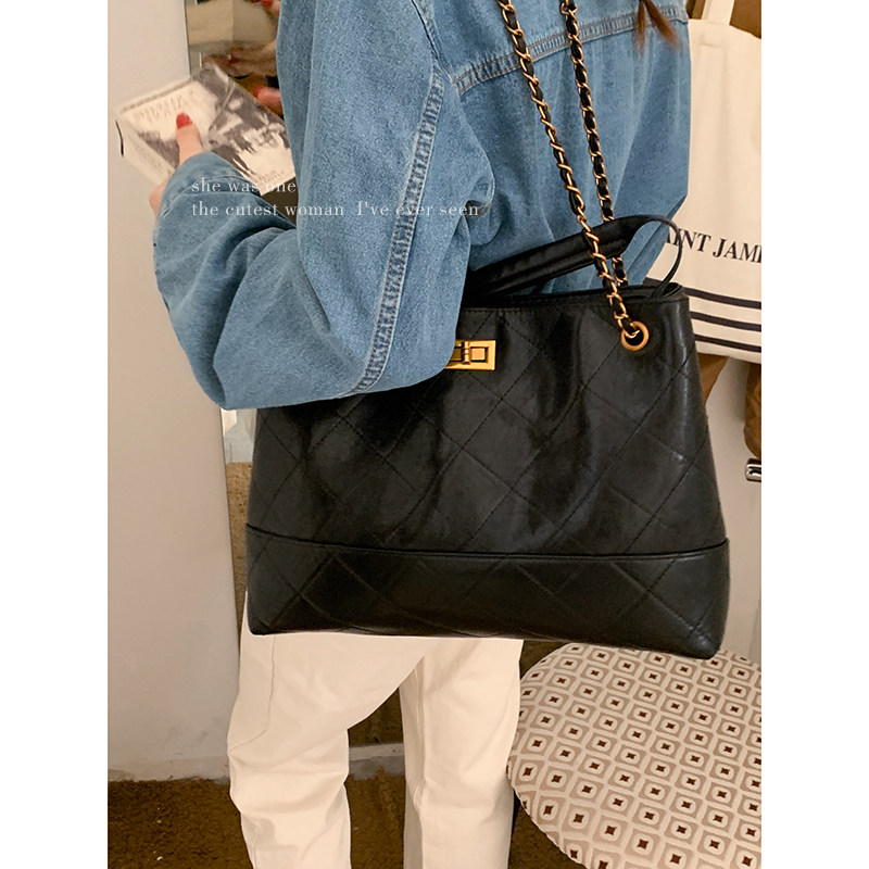 复古鹿皮绒手提通勤包包女2025新款潮时尚托特包百搭大容量流浪包,淘宝优惠券,粉丝福利购,淘宝优惠卷