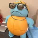 Aojiaojini Turtle Dirdseded 1: 1 Karakara Pikachu Small Fire Dragon Big Model Swing Gift