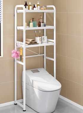 Laundry staircase in a multi-purpose bathroom above the toil