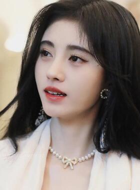 Creating camp bows and pearl butterflies.