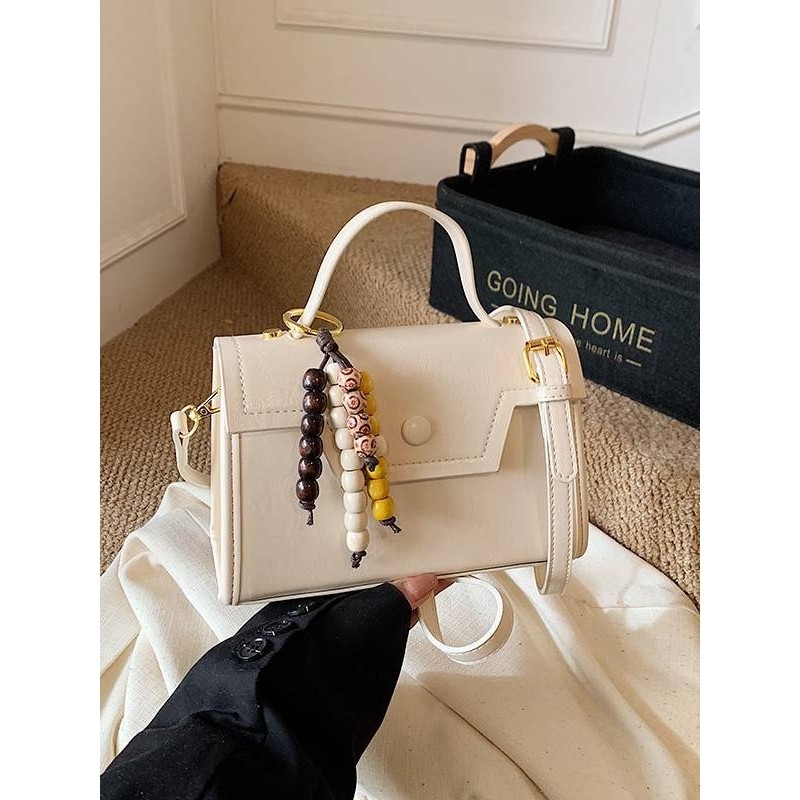 专柜品牌高级感通勤手提包女2025冬季新款洋气小方包纯色软皮单肩,淘宝优惠券,粉丝福利购,淘宝优惠卷