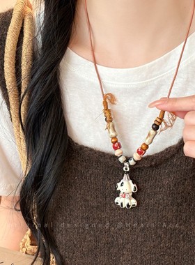 可爱斑点陶瓷小狗彩色串珠项链女新中式可抽拉卡通动物毛衣链配饰