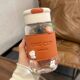 Glass cup for women, good-looking tea cup for men, high borosilicate glass water cup, high temperature resistant, with cup cover, heat-insulating and anti-scalding