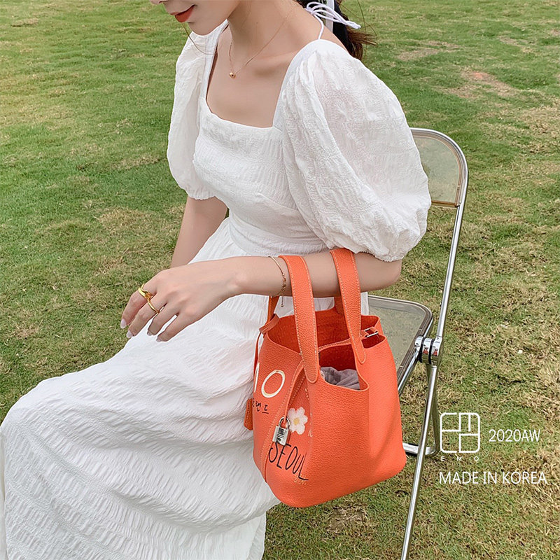 韩国东大门2020新款emo涂鸦水桶包 昕悦女士包袋