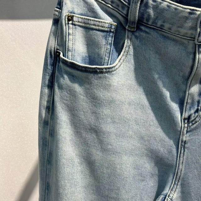 The label has been removed - the brand removed the stretch spring and autumn casual micro-flare denim trousers