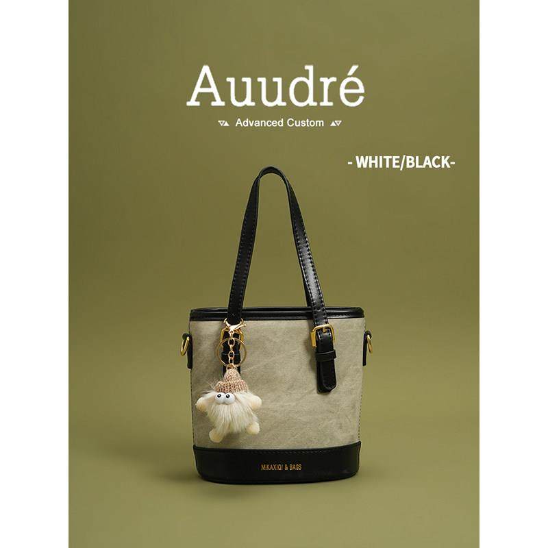 天锚国际时尚撞色手提水桶包包女2026新款春夏百搭洋派斜挎包通勤,淘宝优惠券,粉丝福利购,淘宝优惠卷