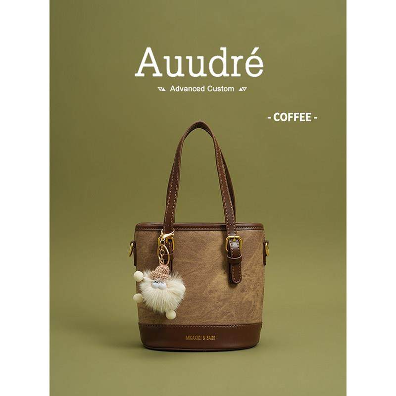 天锚国际时尚撞色手提水桶包包女2026新款春夏百搭洋派斜挎包通勤,淘宝优惠券,粉丝福利购,淘宝优惠卷