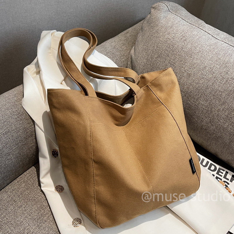 秋冬新款焦糖色帆布包女生简约单肩包容量量实用通勤手提托特包包,淘宝优惠券,粉丝福利购,淘宝优惠卷