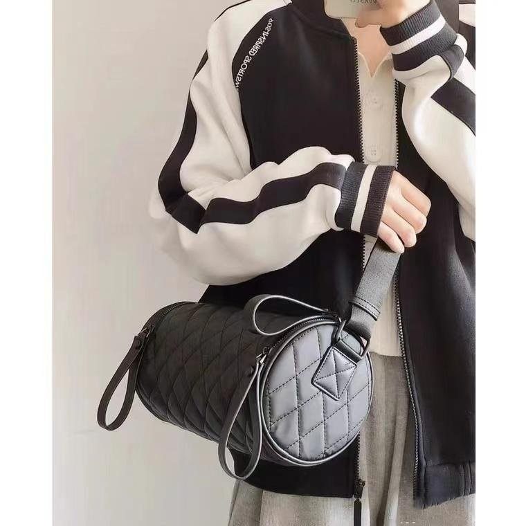 【今日活动】菱格圆筒包包女包斜跨包新款百搭水桶包牛津布单肩包,淘宝优惠券,粉丝福利购,淘宝优惠卷