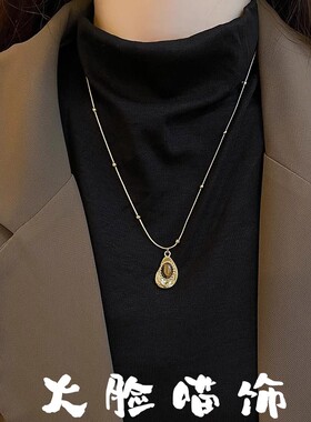 美拉德虎眼石项链女钛钢毛衣链2026网红轻奢小众配饰吊坠搭配饰品