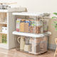 Transparent storage box with plastic clothes and toys