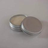 Масло из грунного масла загорелой кожи