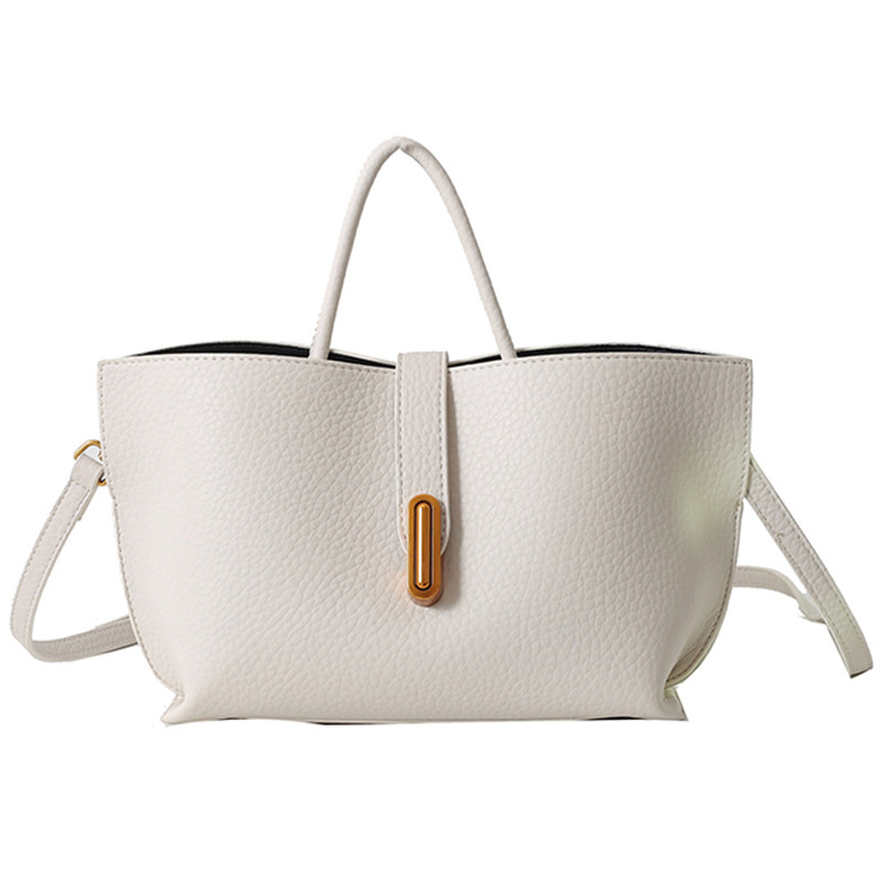 法式独特小众手提包包女2025春夏新款通勤单肩斜挎包大容量水桶包,淘宝优惠券,粉丝福利购,淘宝优惠卷