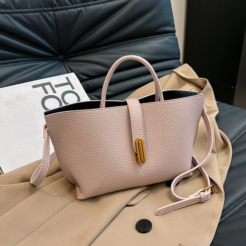 法式独特小众手提包包女2025春夏新款通勤单肩斜挎包大容量水桶包,淘宝优惠券,粉丝福利购,淘宝优惠卷